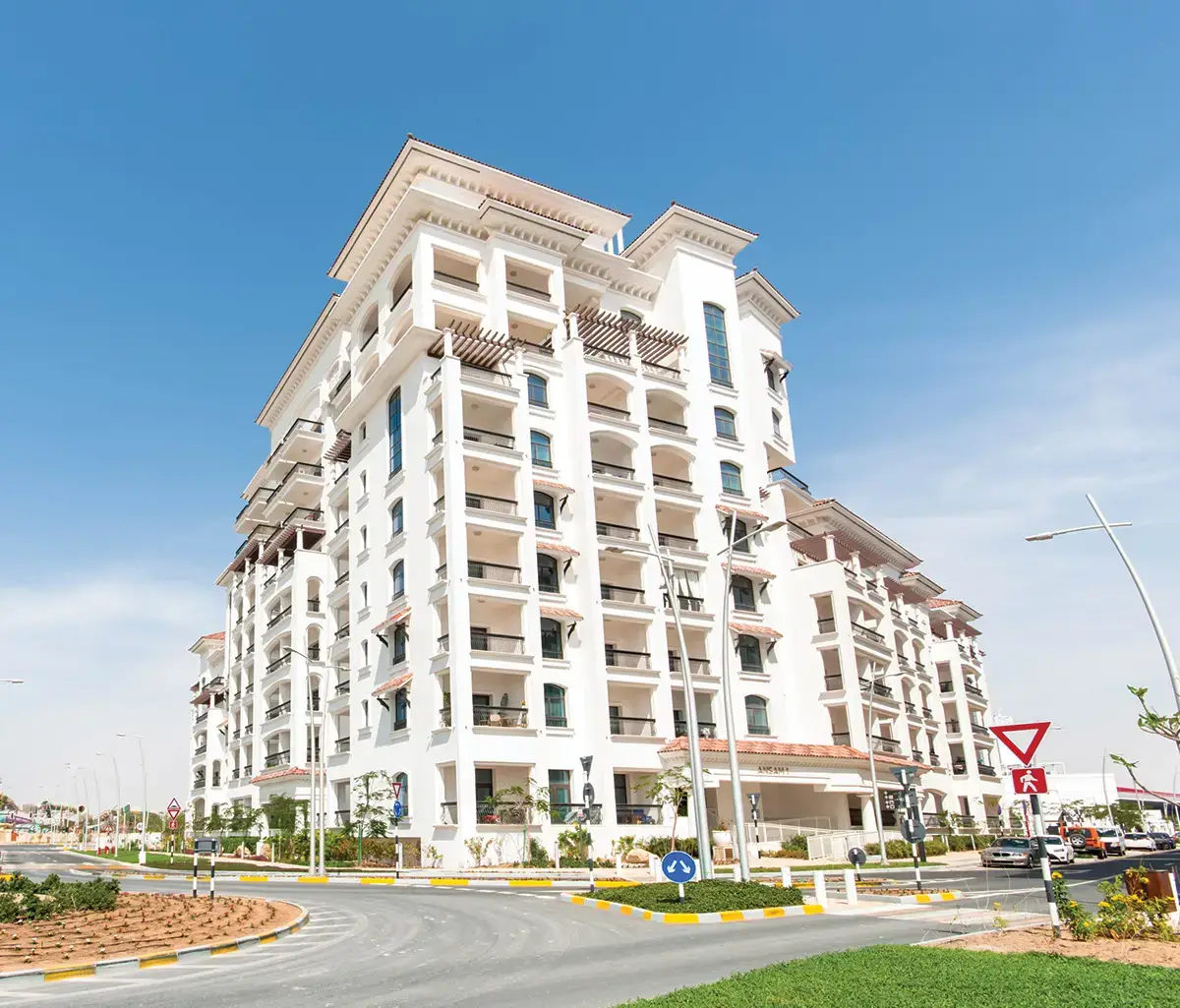 Modern apartment buildings in Ansam, Abu Dhabi with lush landscaping