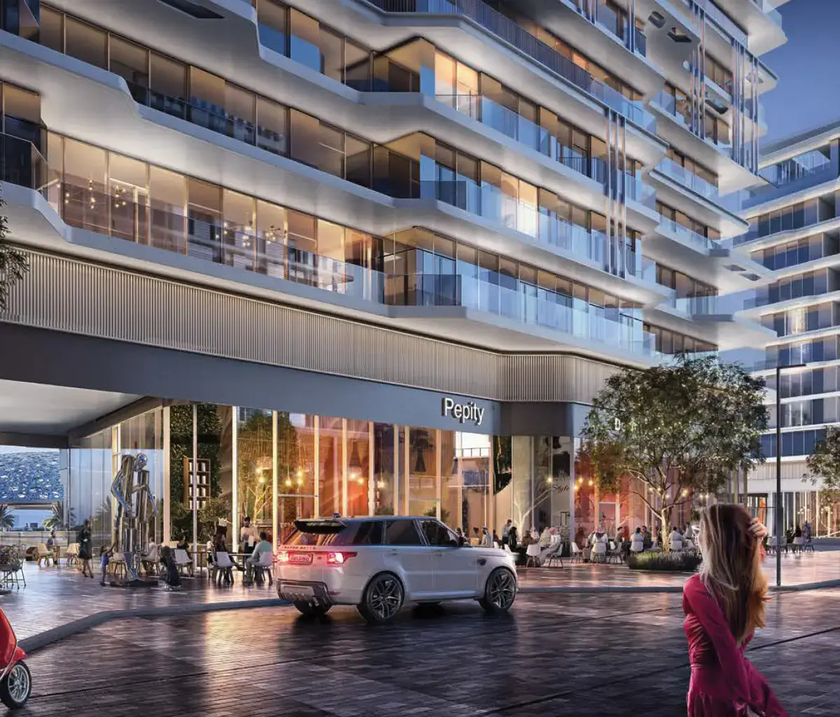 Louvre Residences exteriors with modern architecture and palm-lined pathways