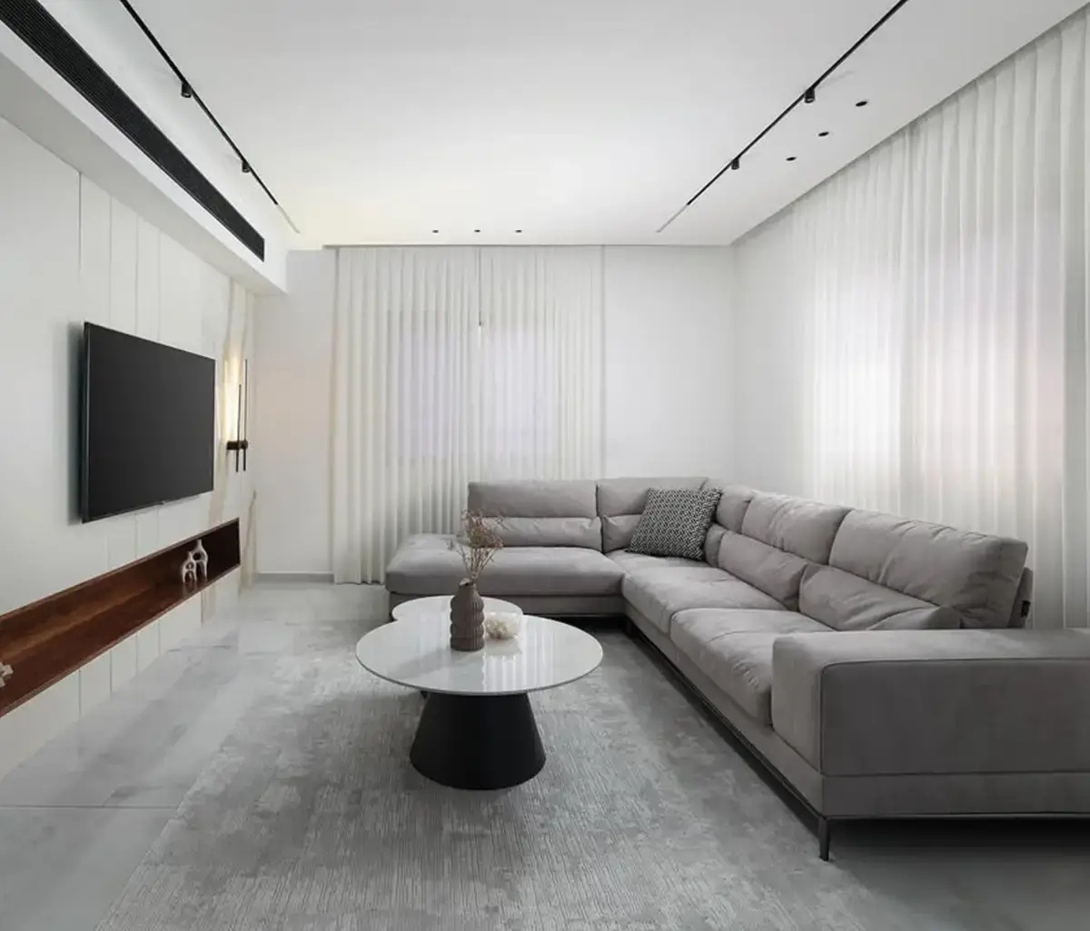 Stylish bedroom with large windows in Ansam Abu Dhabi residence