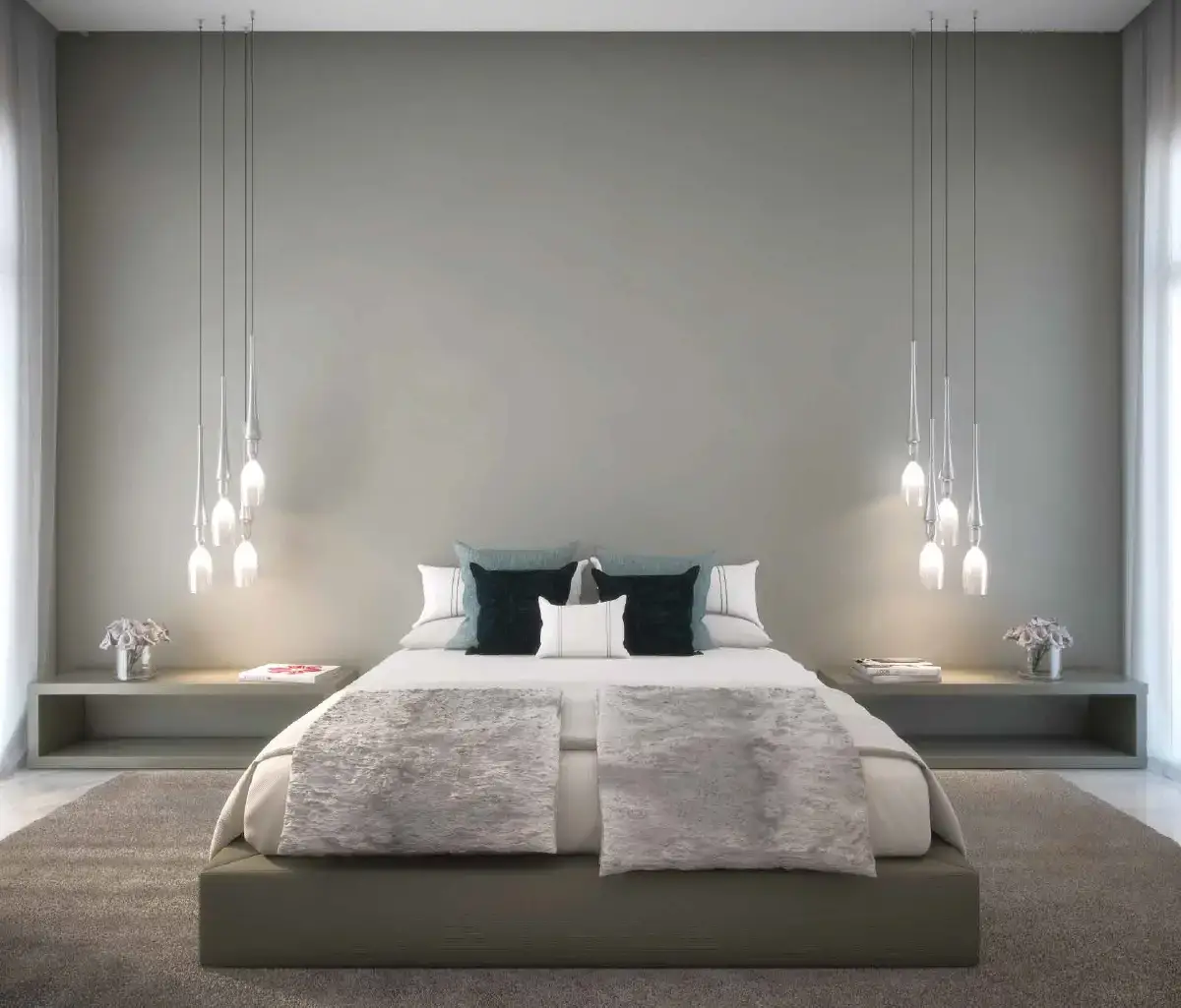 Luxurious master bedroom with balcony access in a West Yas villa