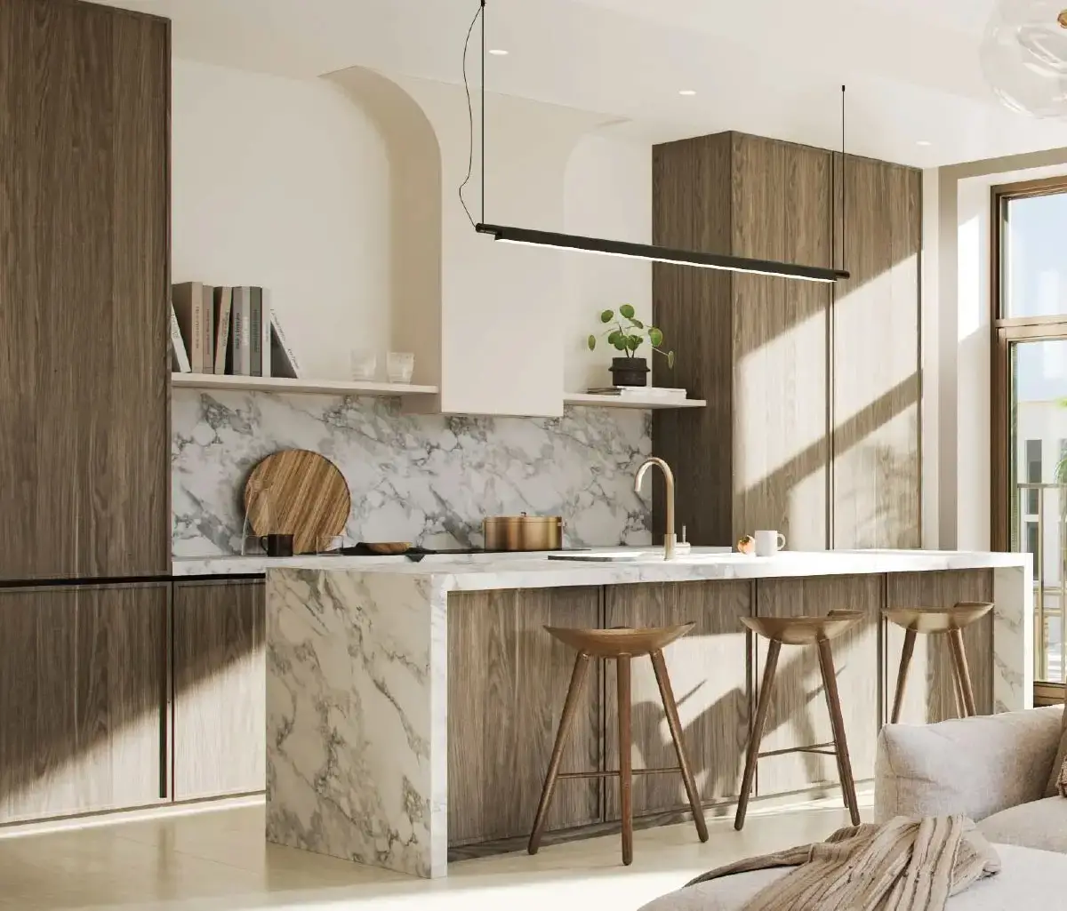 Bright living room with park-facing windows inside Nawayef Park Views apartment, Abu Dhabi