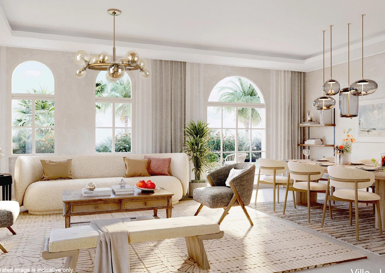 Bright living room with earthy interiors in a Seville Bloom Living villa