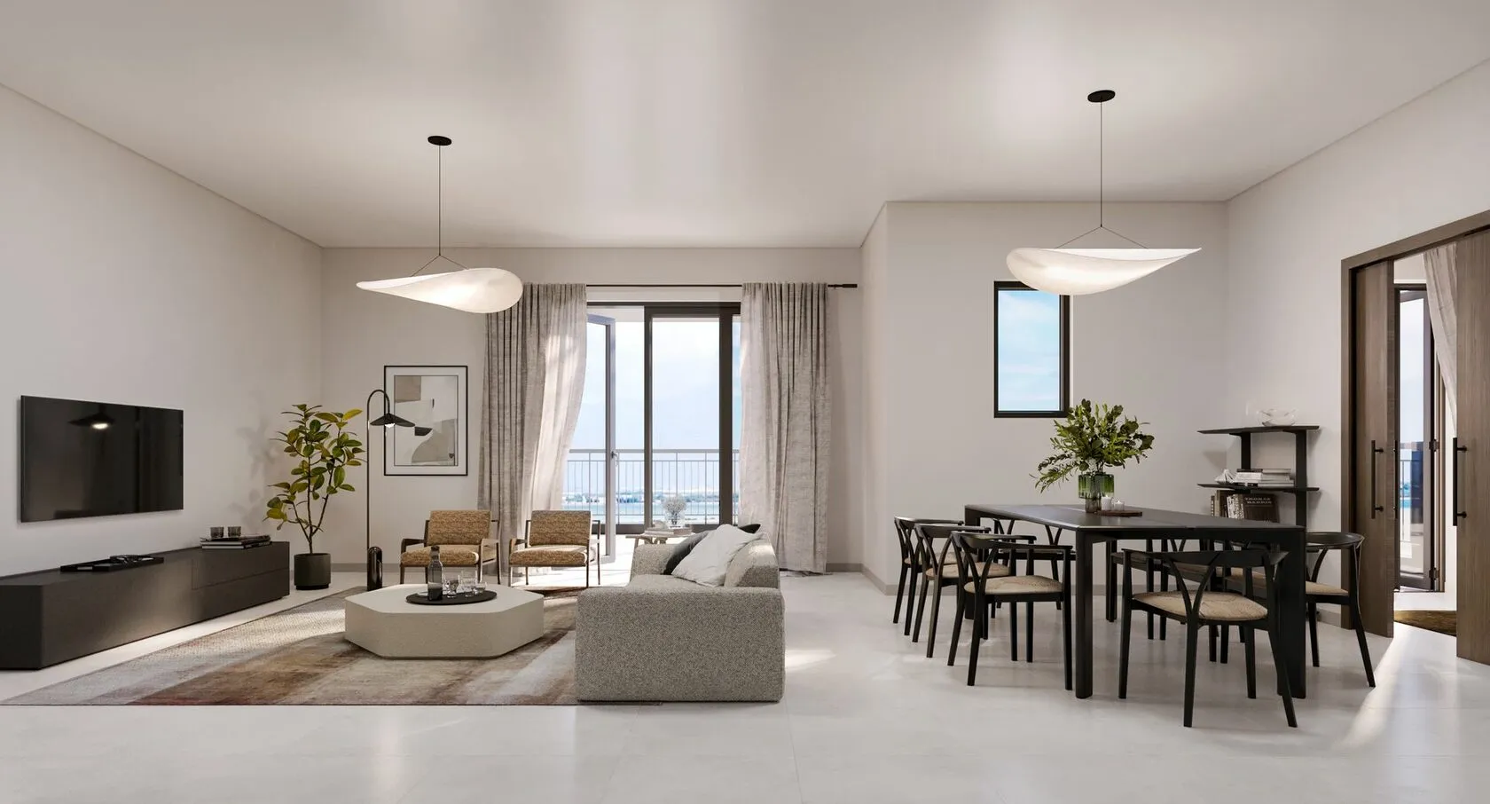 Open-plan kitchen and lounge with modern finishes and natural lighting