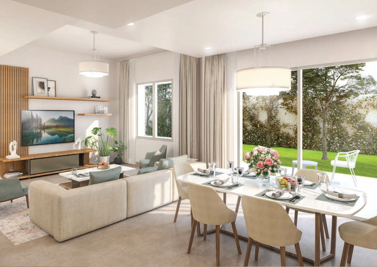 Spacious living area with earth-toned walls and open windows